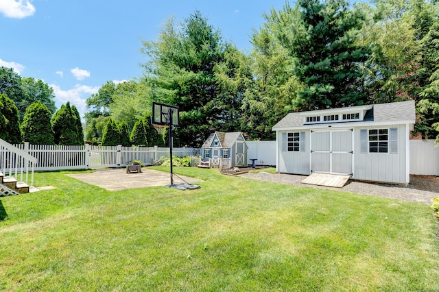 288 Pine Ln, Wethersfield, CT 06109 - fenced backyard with a patio area, a shed, and view of scattered trees