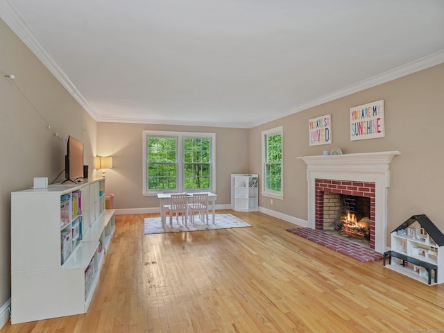 119 Deforest Rd, Wilton, CT 06897 - living area featuring light wood-style flooring, a fireplace, and ornamental molding
