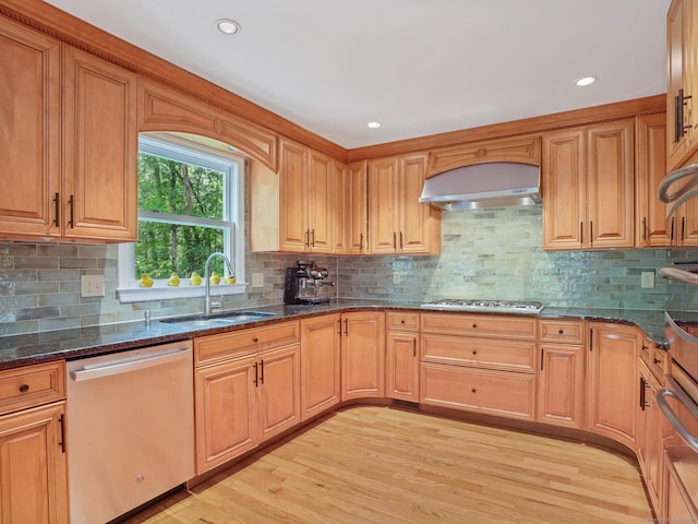 119 Deforest Rd, Wilton, CT 06897 - kitchen featuring stainless steel appliances, ventilation hood, light wood-type flooring, dark stone counters, and tasteful backsplash