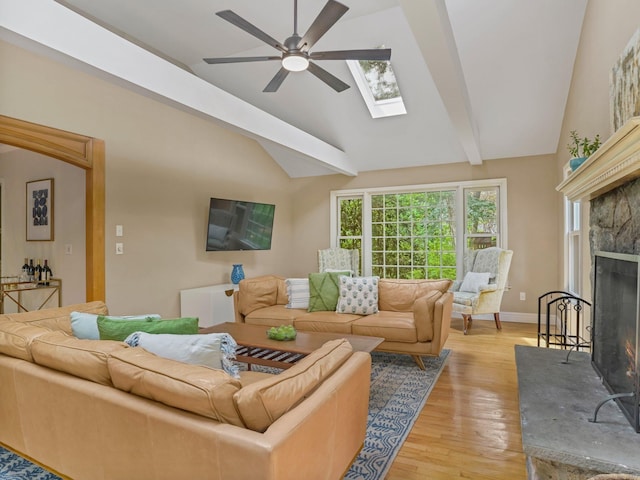 119 Deforest Rd, Wilton, CT 06897 - living area featuring ceiling fan, light wood-style floors, healthy amount of natural light, and a skylight