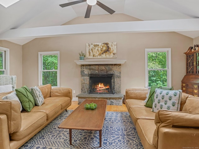 119 Deforest Rd, Wilton, CT 06897 - living area featuring plenty of natural light, a stone fireplace, ceiling fan, and lofted ceiling