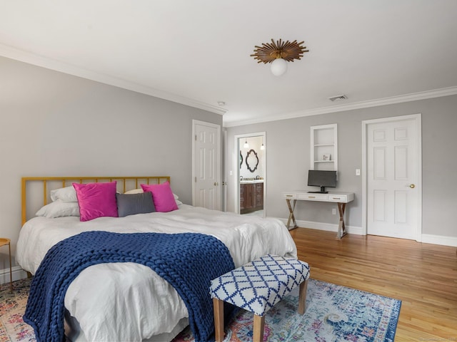 119 Deforest Rd, Wilton, CT 06897 - bedroom with wood finished floors, crown molding, and ensuite bathroom