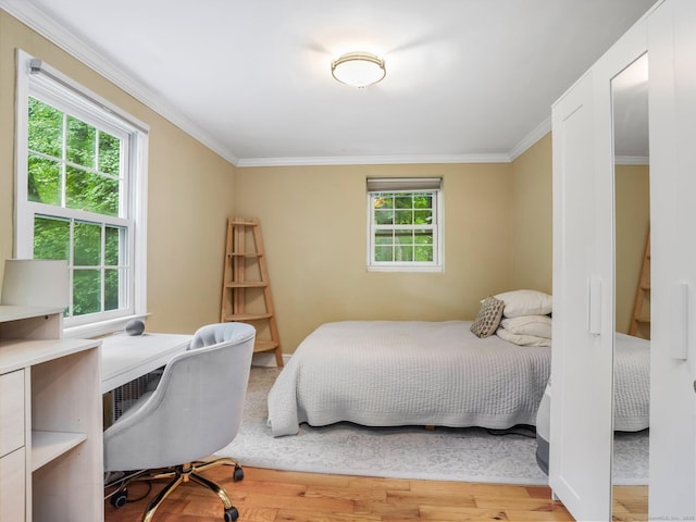 119 Deforest Rd, Wilton, CT 06897 - bedroom featuring crown molding, light wood-type flooring, and an office area