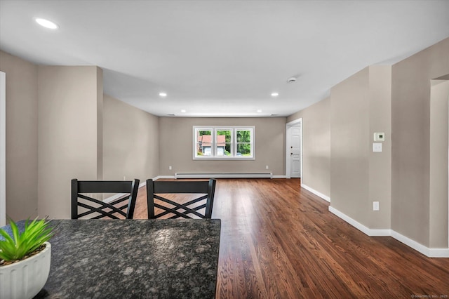2 Riverview Pl, Cromwell, CT 06416 - spare room featuring a baseboard heating unit, wood finished floors, recessed lighting, and a smoke detector