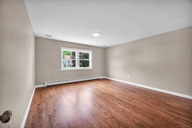 2 Riverview Pl, Cromwell, CT 06416 - unfurnished room with a baseboard radiator and wood finished floors