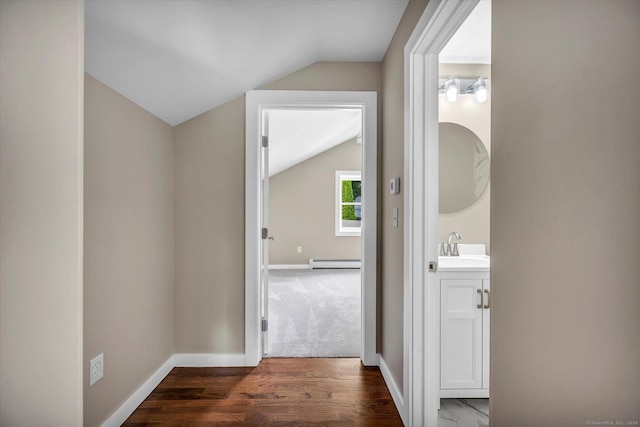 2 Riverview Pl, Cromwell, CT 06416 - corridor with vaulted ceiling, a baseboard radiator, and dark wood-style floors