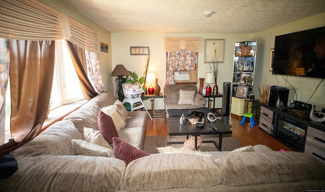116 Michael Ave, East Hartford, CT 06108 - living area with wood finished floors and a textured ceiling