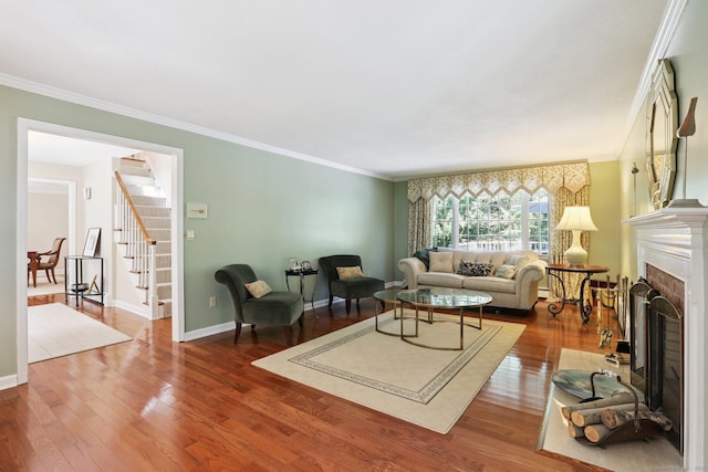 172 Mimosa Cir, Ridgefield, CT 06877 - living area with stairs, a fireplace, wood finished floors, and crown molding