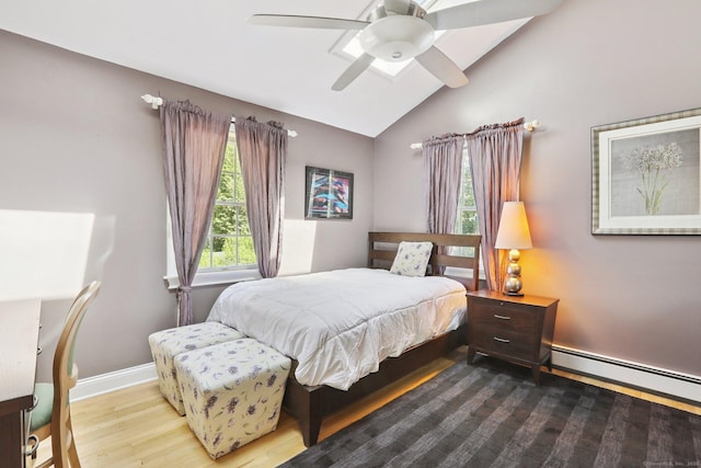 172 Mimosa Cir, Ridgefield, CT 06877 - bedroom with a baseboard radiator, lofted ceiling, wood finished floors, and a ceiling fan