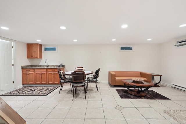 172 Mimosa Cir, Ridgefield, CT 06877 - dining room featuring recessed lighting, light tile patterned flooring, bar with sink, and a baseboard heating unit