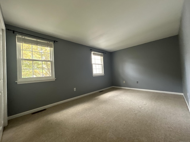 58 E Gate Ln Unit 58, Hamden, CT 06514 - carpeted spare room featuring baseboards