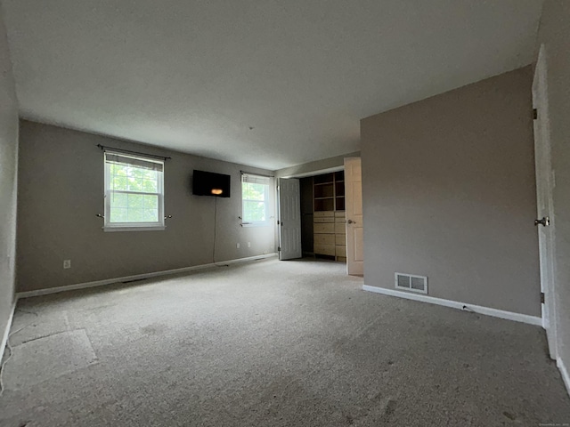 58 E Gate Ln Unit 58, Hamden, CT 06514 - carpeted empty room with baseboards
