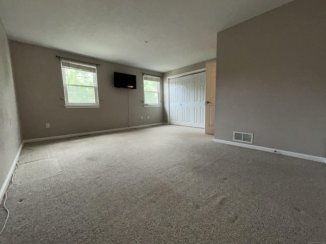 58 E Gate Ln Unit 58, Hamden, CT 06514 - unfurnished bedroom with carpet flooring and a closet