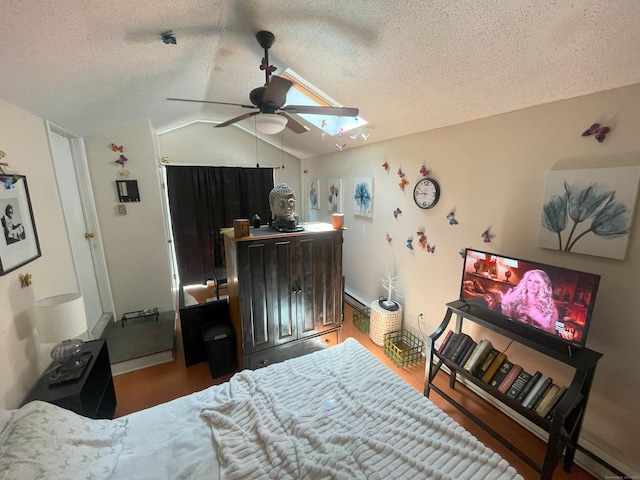 19 Upper Butcher Rd, Ellington, CT 06029 - bedroom featuring vaulted ceiling, a textured ceiling, wood finished floors, and ceiling fan