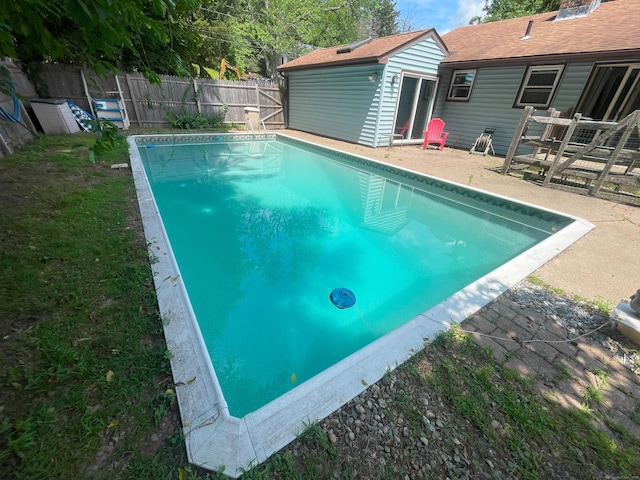 19 Upper Butcher Rd, Ellington, CT 06029 - view of swimming pool with a fenced backyard and an outdoor structure