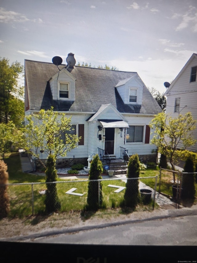 229 Hauser St, Waterbury, CT 06704 - cape cod house with a fenced front yard