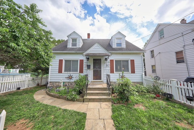 229 Hauser St, Waterbury, CT 06704 - cape cod house featuring roof with shingles