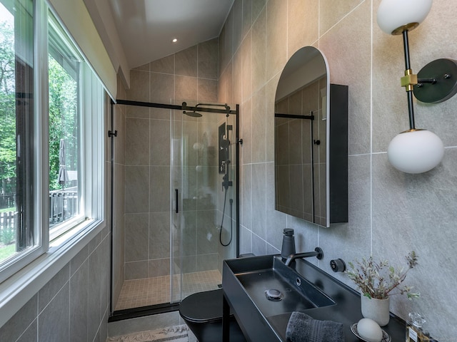 40 Revere Rd, Washington, CT 06793 - bathroom featuring tile walls, plenty of natural light, a stall shower, and vanity