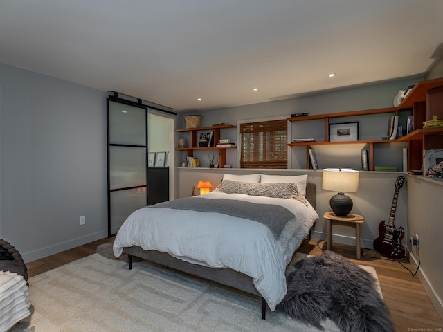 40 Revere Rd, Washington, CT 06793 - bedroom with wood finished floors and recessed lighting