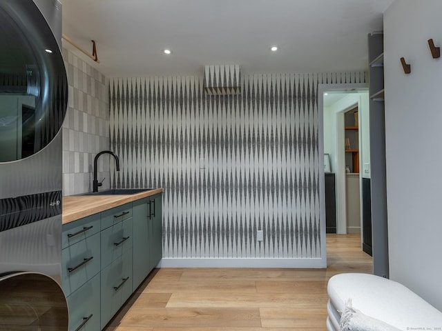 40 Revere Rd, Washington, CT 06793 - bathroom with vanity, wood finished floors, tasteful backsplash, and recessed lighting