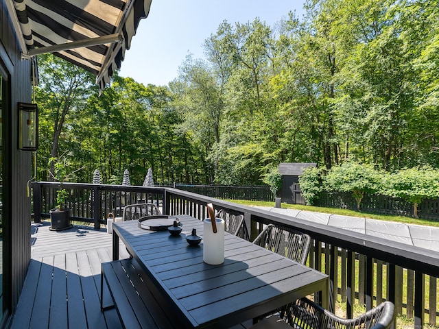 40 Revere Rd, Washington, CT 06793 - deck featuring a storage shed, outdoor dining space, and a fenced backyard