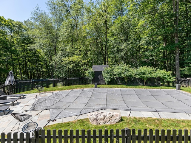 40 Revere Rd, Washington, CT 06793 - view of swimming pool featuring a fenced backyard, a patio, and a shed