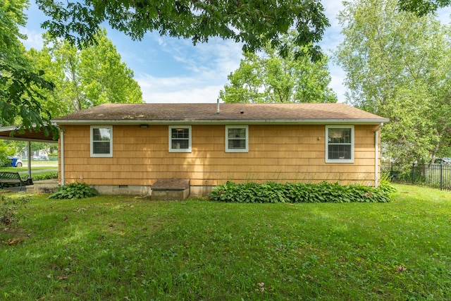 18 Saint Joseph Ct, Groton, CT 06340 - rear view of house with crawl space and a shingled roof