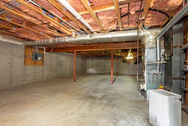 286 Laura Blvd Unit 286, Norwich, CT 06360 - unfinished basement featuring electric panel and heating unit