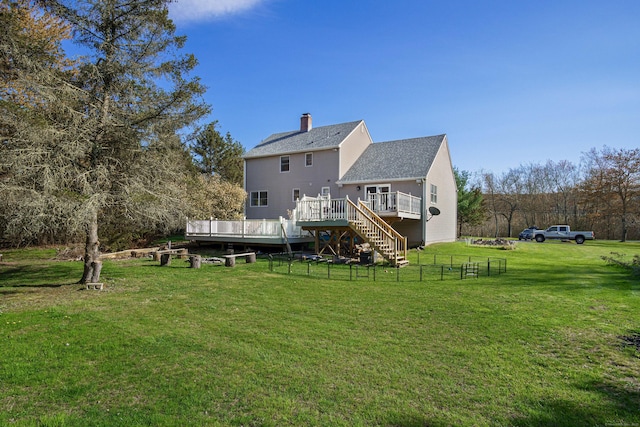 215 Upper Pattagansett Rd, East Lyme, CT 06333 - rear view of house with a wooden deck, a chimney, stairway, and a shingled roof