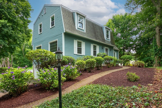 30 Streamview Cir, Guilford, CT 06437 - view of property exterior featuring a gambrel roof and roof with shingles