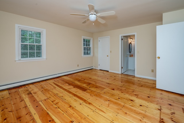 30 Streamview Cir, Guilford, CT 06437 - unfurnished bedroom with a baseboard heating unit, light wood finished floors, and ensuite bathroom