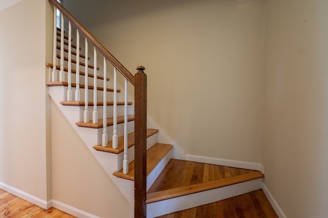 30 Streamview Cir, Guilford, CT 06437 - stairs featuring wood finished floors and baseboards