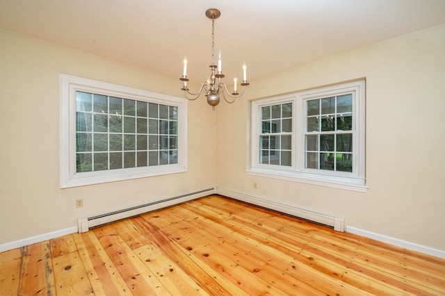 30 Streamview Cir, Guilford, CT 06437 - unfurnished room with a chandelier, a baseboard heating unit, healthy amount of natural light, and a baseboard radiator