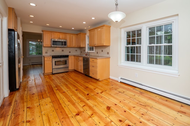 30 Streamview Cir, Guilford, CT 06437 - kitchen with stainless steel appliances, light brown cabinetry, baseboard heating, light wood-style flooring, and recessed lighting