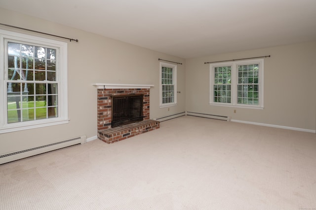 30 Streamview Cir, Guilford, CT 06437 - unfurnished living room with carpet, a baseboard heating unit, and healthy amount of natural light