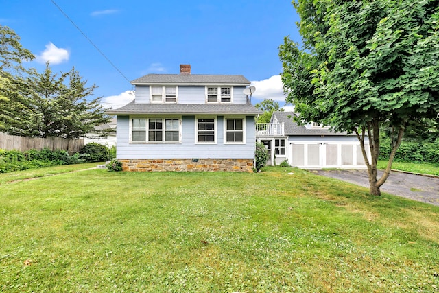 2 Scofield Pl, Norwalk, CT 06855 - view of front of house featuring a chimney, asphalt driveway, and roof with shingles