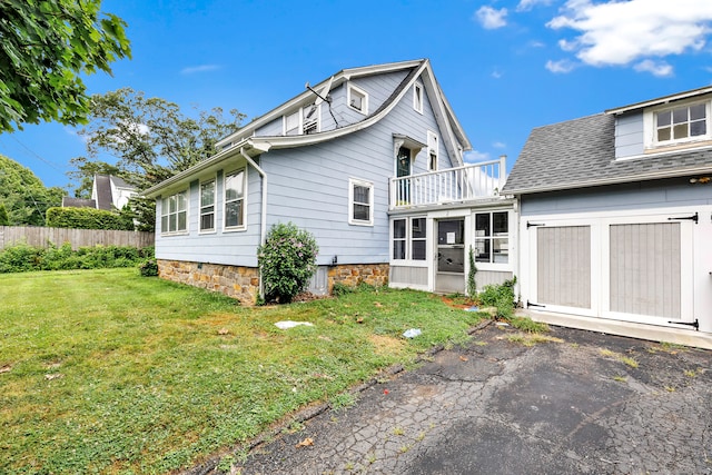 2 Scofield Pl, Norwalk, CT 06855 - back of house featuring a balcony and a sunroom