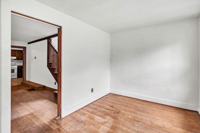 2 Scofield Pl, Norwalk, CT 06855 - empty room featuring light wood-type flooring and stairway