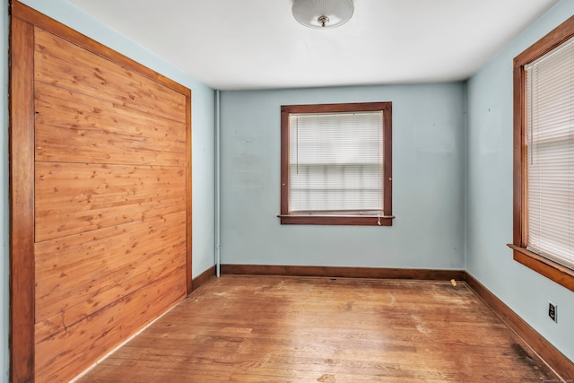 2 Scofield Pl, Norwalk, CT 06855 - spare room featuring wood finished floors and baseboards