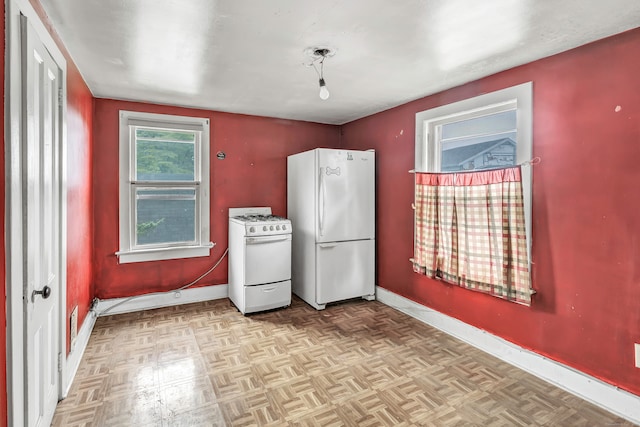2 Scofield Pl, Norwalk, CT 06855 - kitchen featuring white appliances and baseboards