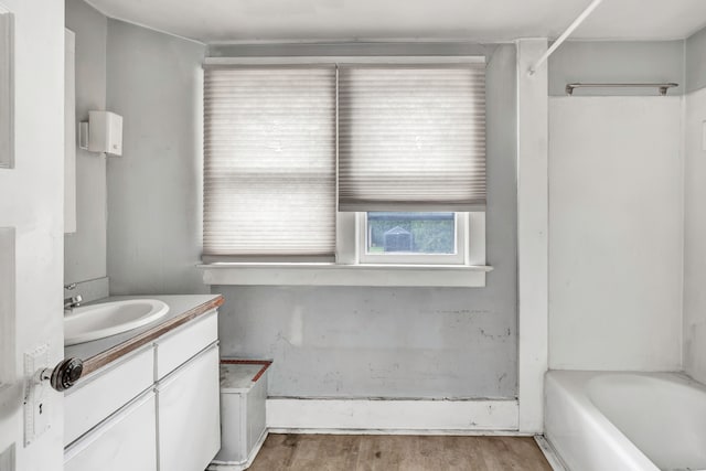 2 Scofield Pl, Norwalk, CT 06855 - bathroom featuring vanity, wood finished floors, and shower / bathtub combination
