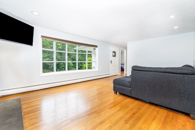 47 Dogwood Ln, Meriden, CT 06450 - living area with a baseboard radiator, wood finished floors, and recessed lighting