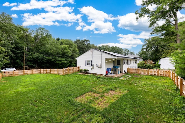 47 Dogwood Ln, Meriden, CT 06450 - back of property with a patio, a fenced backyard, and a shed