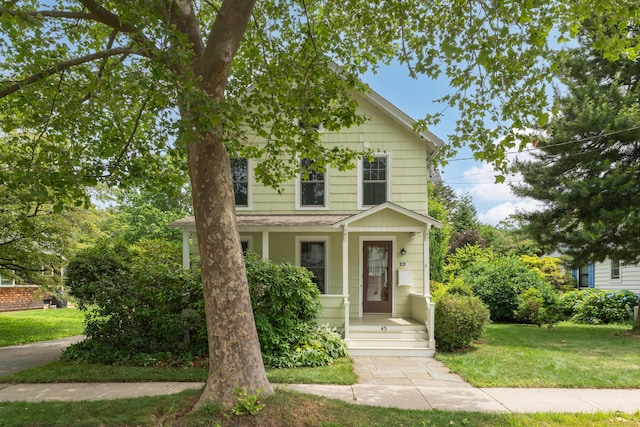45 Graves Ave, Guilford, CT 06437 - american foursquare style home with a front lawn and a shingled roof