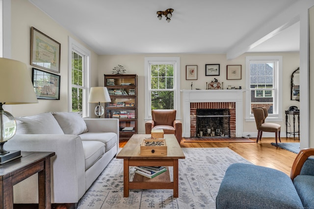 45 Graves Ave, Guilford, CT 06437 - living room with light wood finished floors and a fireplace