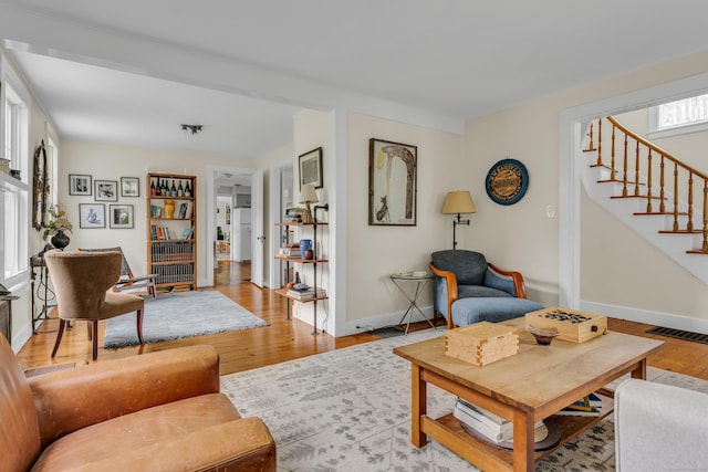 45 Graves Ave, Guilford, CT 06437 - living area featuring stairway and light wood-type flooring