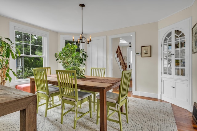 45 Graves Ave, Guilford, CT 06437 - dining area with a chandelier and wood finished floors