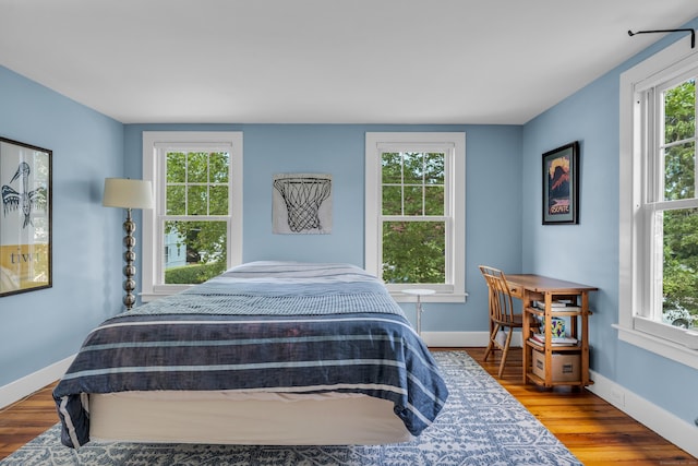 45 Graves Ave, Guilford, CT 06437 - bedroom with wood finished floors and multiple windows