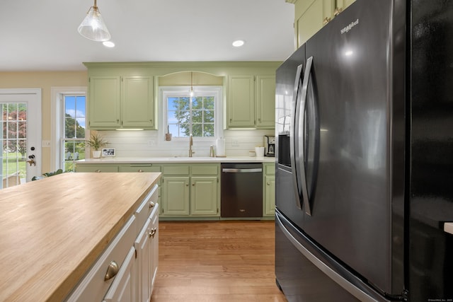 40 Briggs Rd, Lebanon, CT 06249 - kitchen with refrigerator with ice dispenser, green cabinets, dishwasher, butcher block countertops, and light wood-style floors