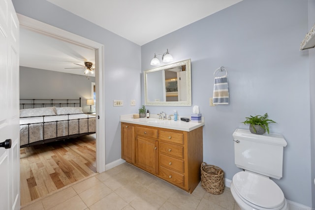 40 Briggs Rd, Lebanon, CT 06249 - bathroom featuring vanity, connected bathroom, ceiling fan, and tile patterned floors